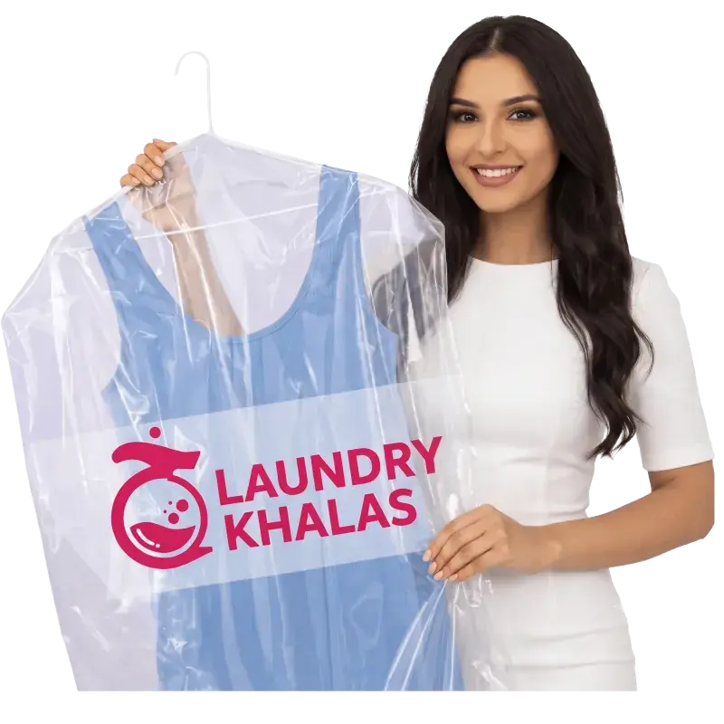 Laundrykhalas driver lifting a bag from a villa step in The Lakes